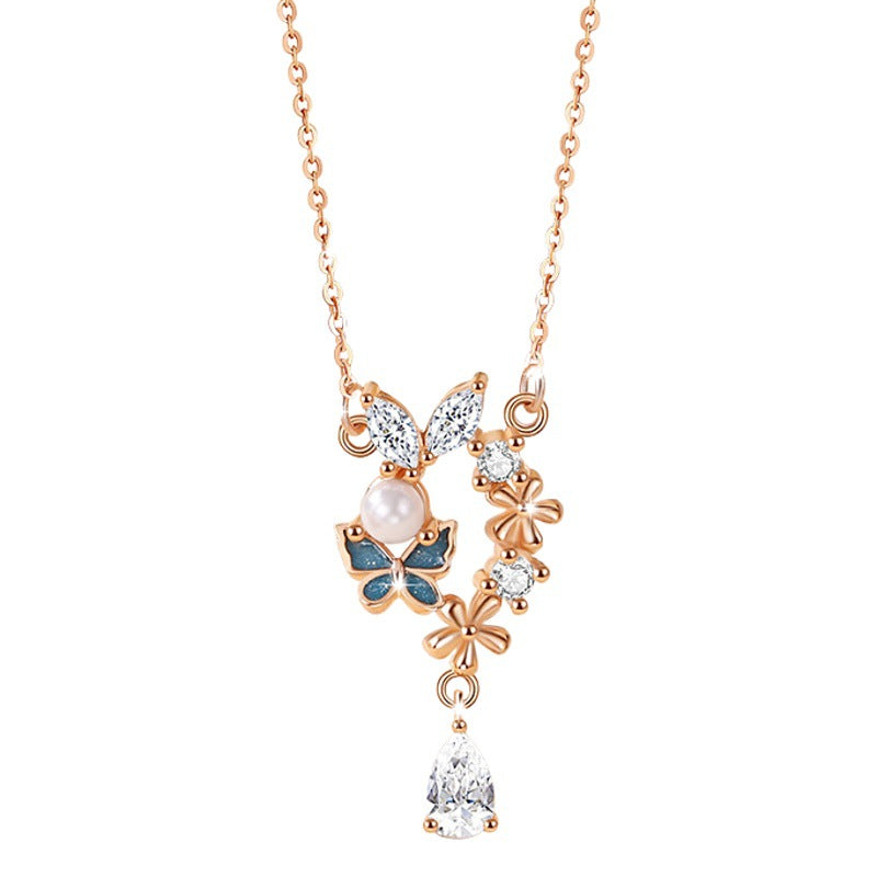 Sterling Silver Butterfly and Flower Necklace – Zircon Accents