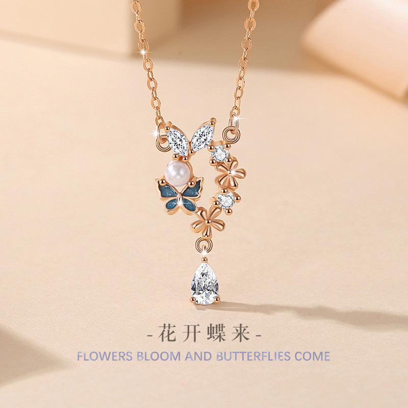 Sterling Silver Butterfly and Flower Necklace – Zircon Accents