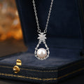 Sterling Silver Snowflake and Teardrop Necklace – Freshwater Pearl