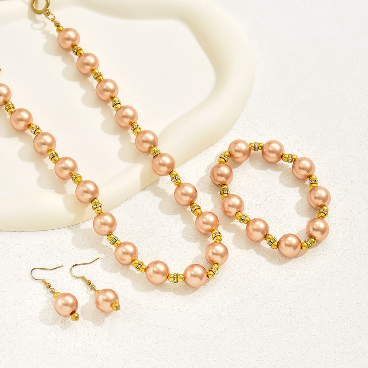 Warm Pearl-Effect Bow Jewelry — product image 2