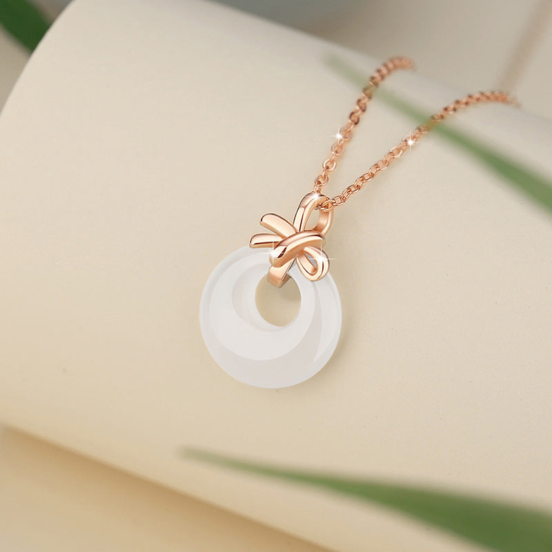 Sterling Silver Disc and Bow Necklace – Chalcedony