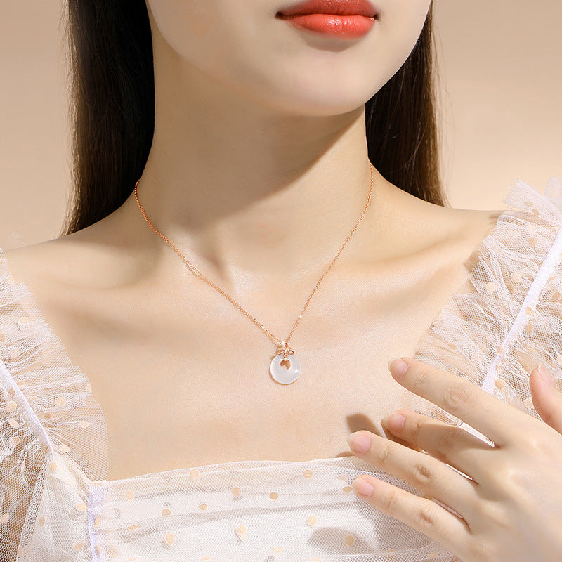 Sterling Silver Disc and Bow Necklace – Chalcedony