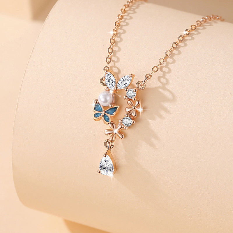 Sterling Silver Butterfly and Flower Necklace – Zircon Accents