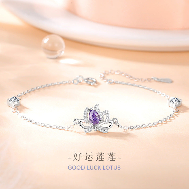 Sterling Silver Lotus and Bow Bracelet – Zircon Accents
