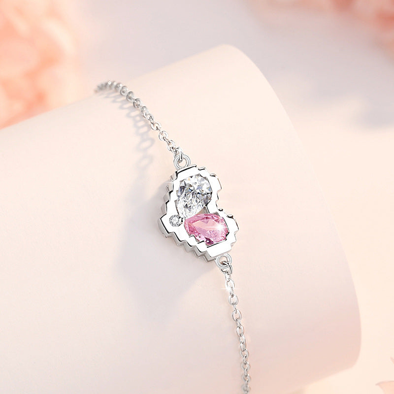Armband aus 925er Sterlingsilber – Herz und rosa Zirkonia