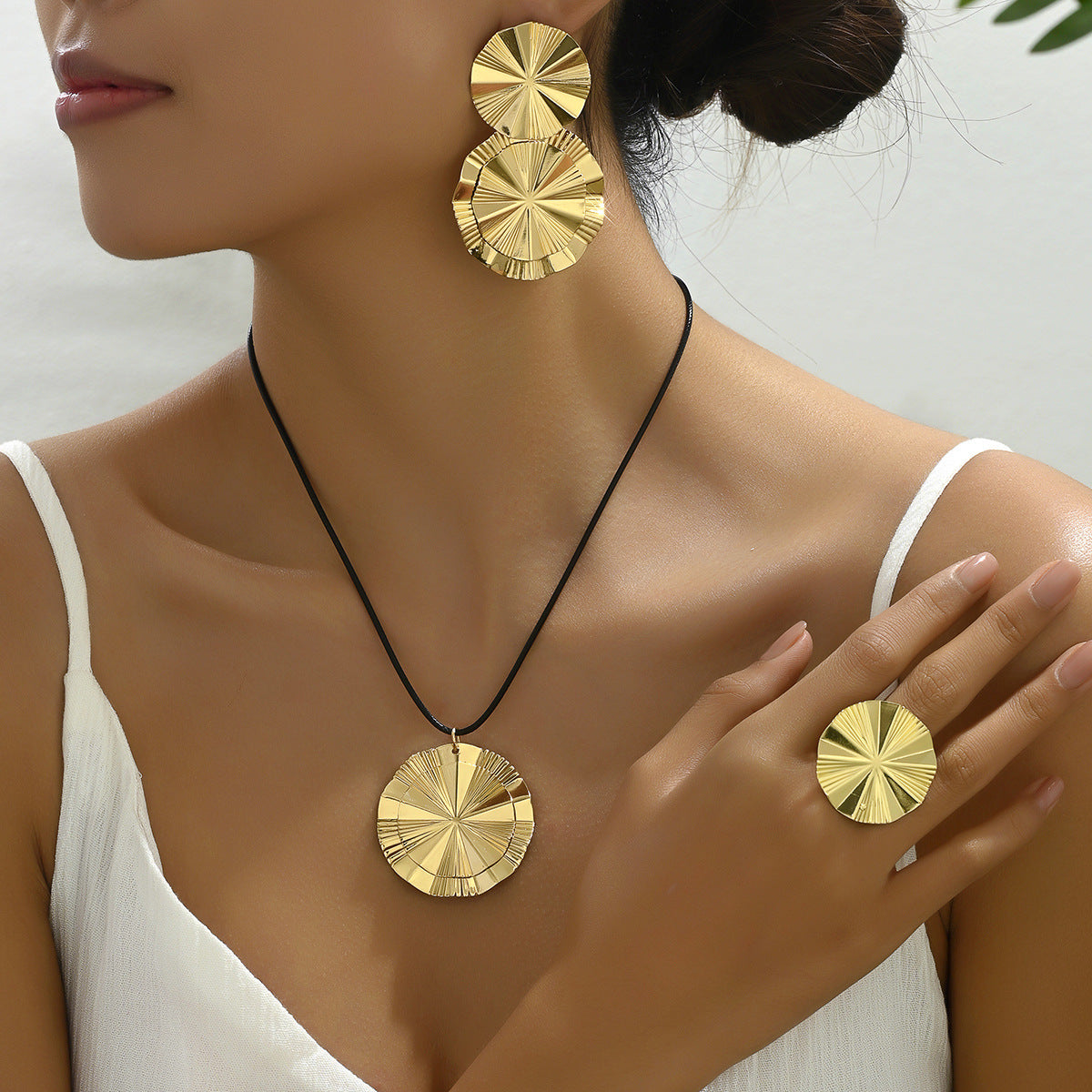 Folded Round Disc Jewelry — product image 2