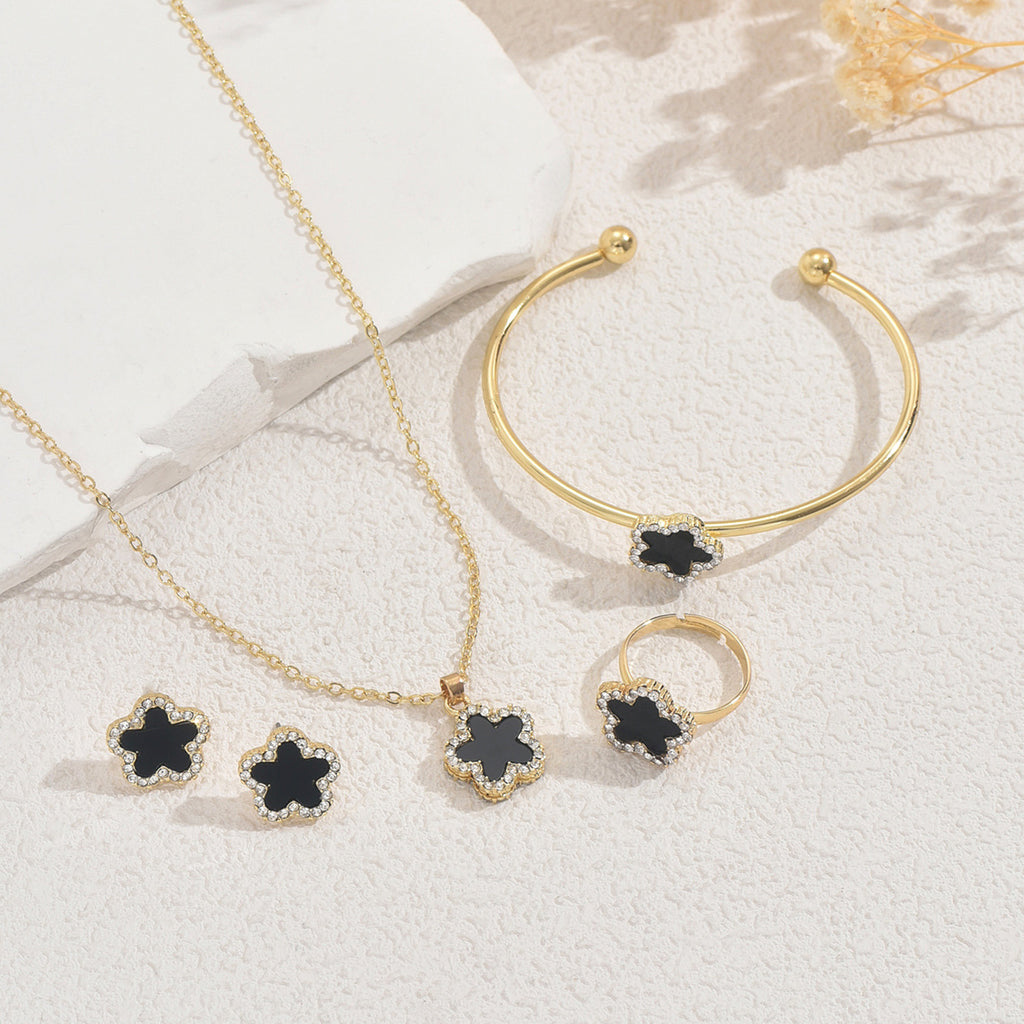 Tiny Black Blossom Jewelry — product image 2