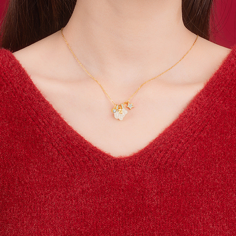 Halskette aus 925er Sterlingsilber – Blüte und Stern und Hetian-Jade