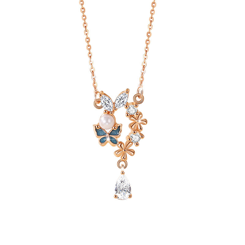 Sterling Silver Butterfly and Flower Necklace – Zircon Accents