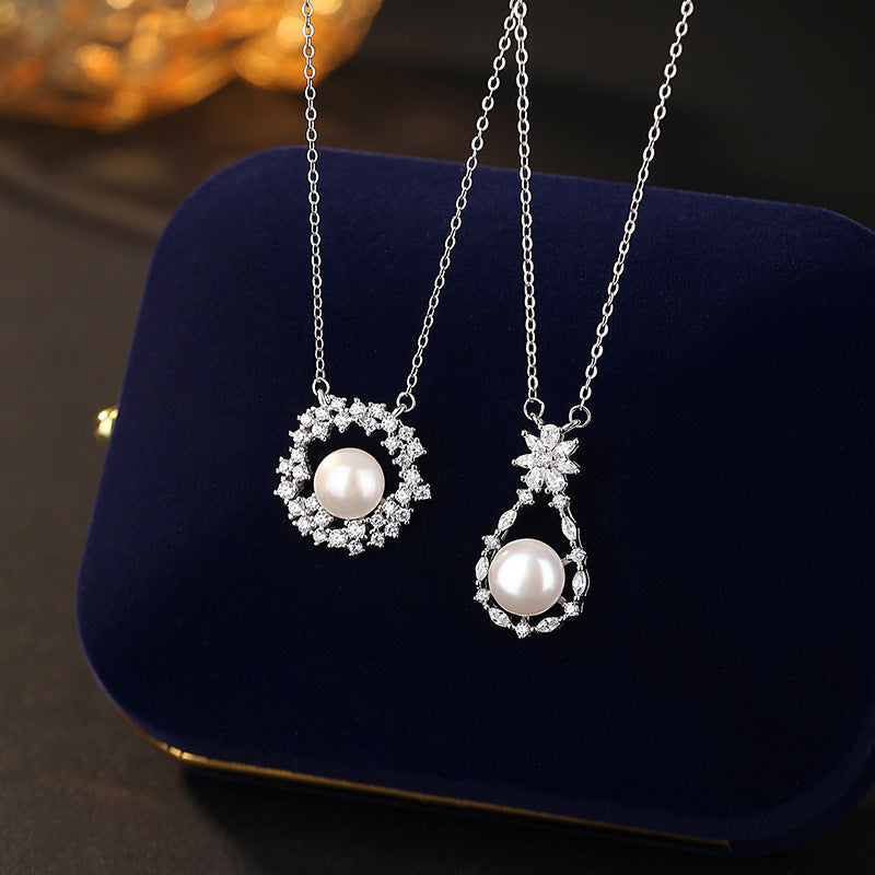 Sterling Silver Snowflake and Teardrop Necklace – Freshwater Pearl
