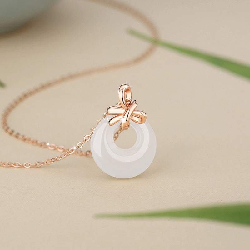 Sterling Silver Disc and Bow Necklace – Chalcedony
