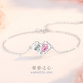 Armband aus 925er Sterlingsilber – Herz und rosa Zirkonia